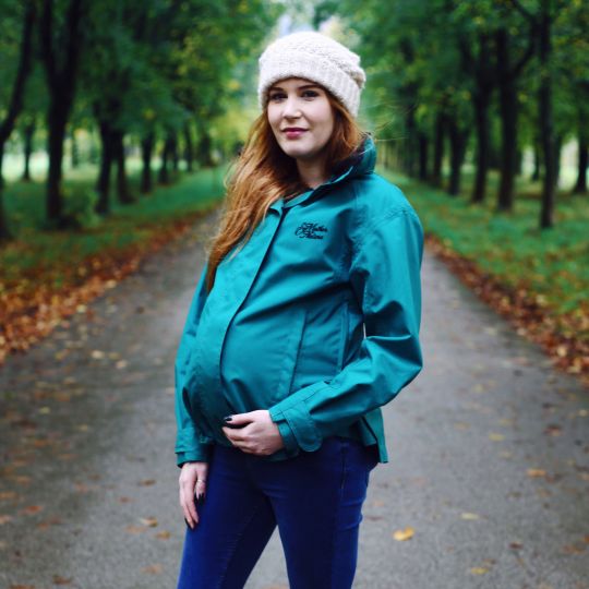 Woman hiking while pregnant