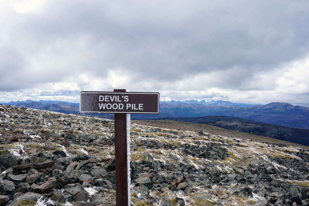 Signpost on mountain trail