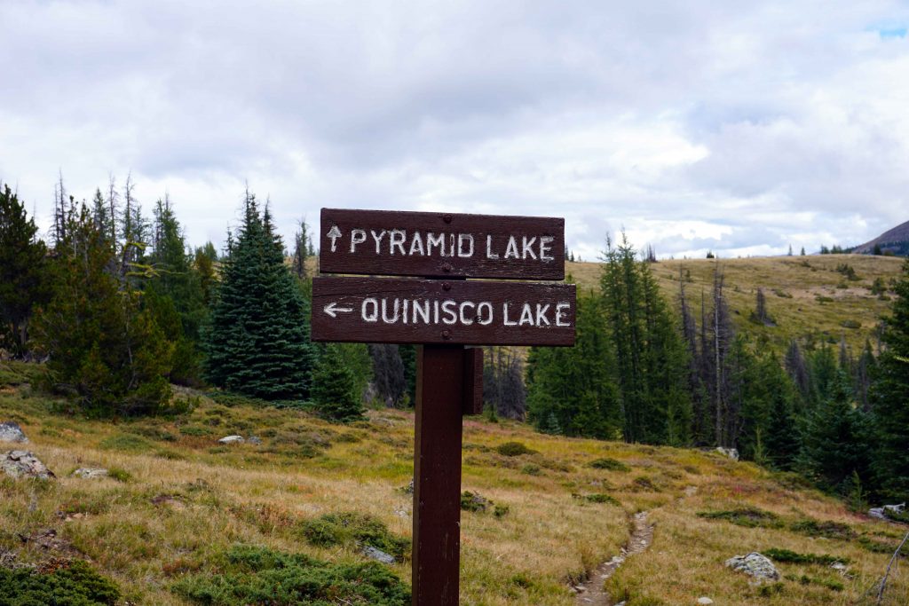 Signpost on mountain trail